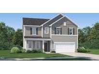 Charming two-story home with a two-car garage, landscaped yard, and craftsman style accents at 4009 Shadbush St, Raleigh, NC 27616