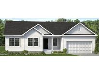Charming one-story home features a two-car garage, gabled roof and a welcoming front porch, set against a backdrop of lush greenery at 4459 Poppy Mallow Ln, Oxford, NC 27565