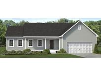 Charming single-Gathering home featuring a covered porch, an attached two-car garage and manicured front lawn at 4465 Poppy Mallow Ln, Oxford, NC 27565