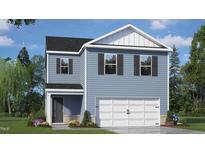 Charming two-story home with blue siding, white trim, and a two-car garage, complemented by a landscaped front yard at 552 Stream Walk Xing, Wendell, NC 27591