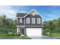 Charming two-story home with a dark gray exterior, a front-entry garage and a well-manicured lawn at 1412 Maple Branch Cir # 35, Graham, NC 27253