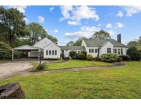 Charming one-story home with a well-manicured lawn, complemented by a convenient carport at 1146 Rogers Rd, Graham, NC 27253