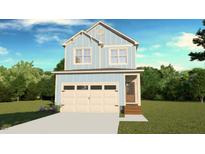 Charming two-story home featuring light blue siding, a two-car garage, and a well-manicured lawn at 6782 Calais Dr, Durham, NC 27712
