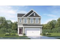 Charming two-story home featuring gray siding, a two-car garage, and well-manicured landscaping at 736 Swim Cave Ln, Wendell, NC 27591