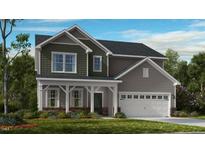 Charming two-story home featuring a covered porch and a two-car garage at 618 Contento Ct, Sanford, NC 27330