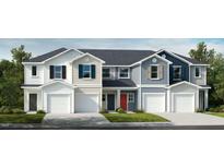 Charming townhome exteriors showcase varied colors and attached garages for a modern look at 10564 Brookside Reserve St, Raleigh, NC 27614