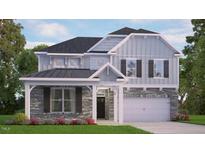 Charming two-story home featuring a stone facade, covered porch, and attached two-car garage at 2217 Red Admiral Ct, Apex, NC 27539