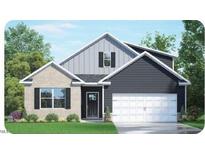 Charming two-story home features a white garage door and a combination of stone and vinyl siding at 2233 Redpoll Dr, Apex, NC 27539