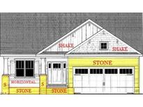 Charming home featuring stone accents, shake detailing, a welcoming front door, and a convenient two-car garage at 57 Laramie Ln, Selma, NC 27576