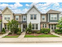Charming townhome with well-manicured lawn and landscaping, perfect for curb appeal at 1728 Shady Oaks Dr, Wendell, NC 27591