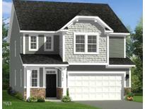 Charming two-story home with a two-car garage and stone accents at 243 Steel Springs Ln # 25, Angier, NC 27501