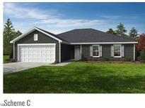 Charming single-story home with a well-manicured lawn and a two-car garage, offering comfort and curb appeal at 37 Matthew Meadow Ln, Lillington, NC 27546