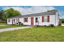 Charming multi-unit home with a well-maintained lawn and inviting red accents at 501 Magnolia Dr, Rocky Mount, NC 27801