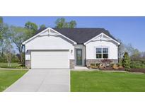 Charming single-Gathering home boasts white siding, stone accents, a green front door, and a well-manicured lawn at 158 Vaughan Farms Drive Dr, Angier, NC 27501