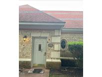 Charming brick home featuring a classic front door design and an inviting entryway with lovely architectural detail at 158 Presidents Dr, Durham, NC 27704
