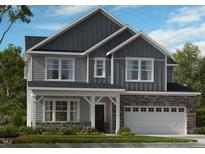 Charming craftsman-style home with stone accents, gray siding, and a welcoming covered porch at 2512 Stonington Dr, Cary, NC 27523
