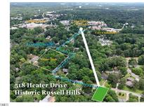 Fantastic aerial view showcases the home's proximity to Heater Park and downtown Cary with a quick 10-minute walk at 518 Heater Dr, Cary, NC 27511