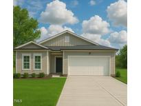 Charming single-story home with a two-car garage, landscaped yard, and neutral color palette at 284 Johnson Ridge Way, Four Oaks, NC 27524