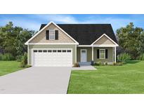 Charming, newly constructed home featuring a gabled roof and a manicured lawn at 2803 Ricolden Trl, Elon, NC 27244