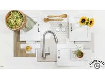 Bright selection of classic white cabinet door with a collection of modern kitchen materials at 537 Folk Song Way, Wendell, NC 27591