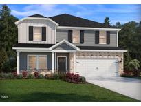 Inviting two-story home featuring a stone facade, gray siding, black shutters and a two-car garage, set on a well-manicured lawn at 685 White Birch Ln, Angier, NC 27501