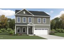 Charming two-story home with neutral siding, white trim, and attached two-car garage at 1303 Cosmic Dr, Durham, NC 27703