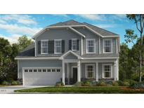 Charming two-story home with a well-manicured lawn, attached two car garage and classic craftsman details at 1900 Clydner Dr, Apex, NC 27523