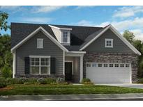 Charming gray home featuring stone accents, a two-car garage, and professionally landscaped yard at 237 Tidal Pool Way, Cary, NC 27519