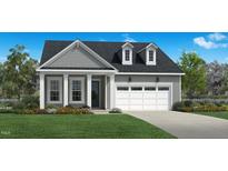 Charming craftsman-style home with gray siding, white trim, and a well-manicured front lawn at 2400 Fleming Stone Ln # 52, Raleigh, NC 27610