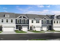 New townhome exteriors with stone accents, well-kept lawns, and integrated two-car garages at 2730 Sammish Way, Wake Forest, NC 27587