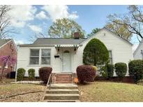 Charming single-story home with a manicured lawn and inviting curb appeal at 1112 N Driver St, Durham, NC 27701