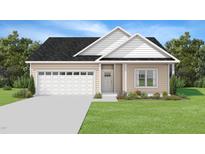Charming one-story home with a well-maintained lawn, attached garage and delightful curb appeal at 2820 Ricolden Trl, Elon, NC 27244