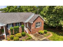 Charming brick home with a well-manicured front yard and inviting entrance at 1731 Malone Rd # A, Burlington, NC 27215