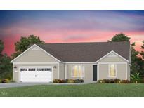 Charming single-story home with a two-car garage, neutral siding, and a well-manicured lawn at 123 Arcadius Dr, Clayton, NC 27520