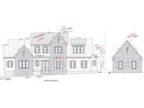 Detailed architectural drawing of a two-story home with brick facade and intricate roof detailing at 227 Gaines Trail Trl, Pittsboro, NC 27312