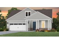Charming two-story home featuring an attached garage and a covered front porch framed by elegant columns at 323 Arcadius Dr, Clayton, NC 27520