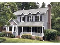 Charming two-story home with a covered front porch and well-maintained landscaping at 2708 Halfhitch Trl, Raleigh, NC 27615