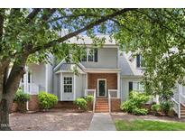 Charming two-story home with brick accents and a landscaped front yard at 2623 Broad Oaks Pl, Raleigh, NC 27603
