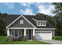 Charming home with stone accents, a grey roof, and a two-car garage at 1062 Beacon Hill Rd # 45, Lillington, NC 27546