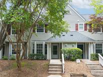Charming townhome with well-maintained landscaping and a welcoming entrance at 105 Sir Richard Ln, Chapel Hill, NC 27517