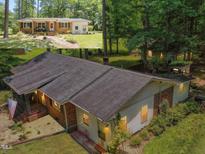 Aerial view of house with lush green trees at 1139 Princeton Kenly Rd, Kenly, NC 27542