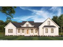 Charming new construction with board and batten siding, inviting porch, and beautiful architectural details at 193 Jim S Rd, Cameron, NC 28326