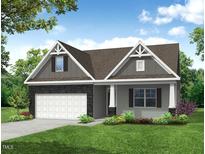Charming single-Gathering home with a mix of stone and siding, complemented by a well-manicured lawn at 109 Arundel Dr, Archer Lodge, NC 27527