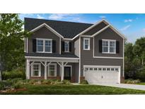 Charming two-story home with gray siding, black shutters, and a two-car garage at 1016 Dillon Lake Dr, Knightdale, NC 27545