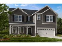 New construction gray two-story home with a two-car garage and covered porch at 113 Seagraves Creek Ln, Holly Springs, NC 27540