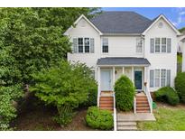 Charming two-story home featuring well-maintained landscaping and a classic facade at 2001 Turtle Point Dr, Raleigh, NC 27604