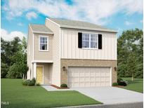 Charming two-story home featuring a brick-accented garage, board and batten siding, and a well-manicured lawn at 1217 Solace Way, Rolesville, NC 27571