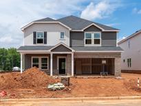 New construction two-story home featuring brick accents, neutral color palette and an attached two car garage at 760 Deschutes Dr, Garner, NC 27529