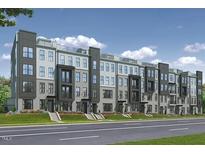 Stunning new construction townhomes featuring a modern architectural design and meticulously landscaped grounds at 509 Kildaire Farm Rd # 106, Cary, NC 27511