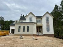 New construction home with two stories and neutral siding, ready for personalization at 155 Cherry Bark Dr, Youngsville, NC 27596